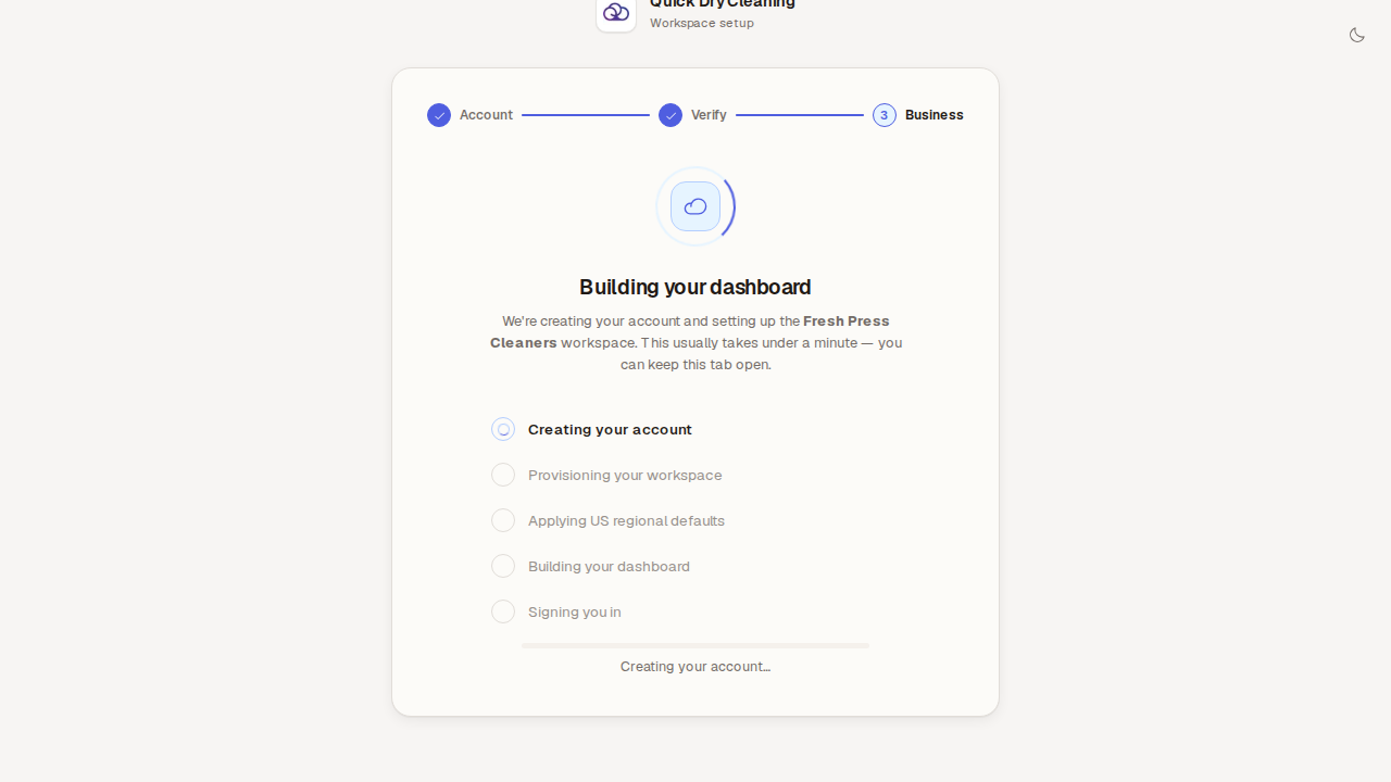 The Building your dashboard screen listing the setup stages, from Creating your account to Signing you in.