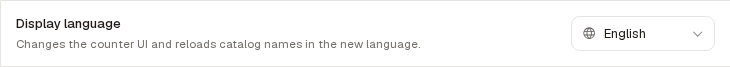 The Display language row on Settings → Preferences, set to English, described as changing the counter screens and reloading catalog names in the new language.