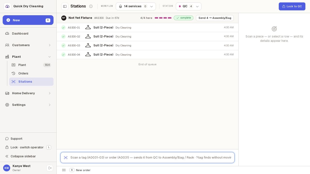 The QC bench holding all four garments of one order, its header marked "complete", and no prompt anywhere on the screen — the order still has a bench to go.